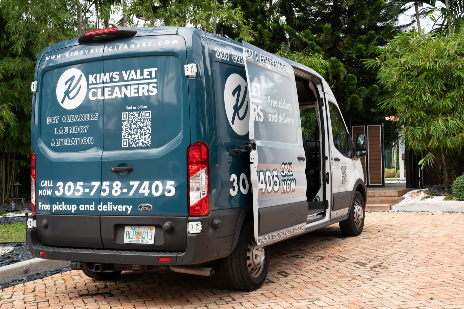 The Kim's Valet Cleaners van delivering to a Miami home